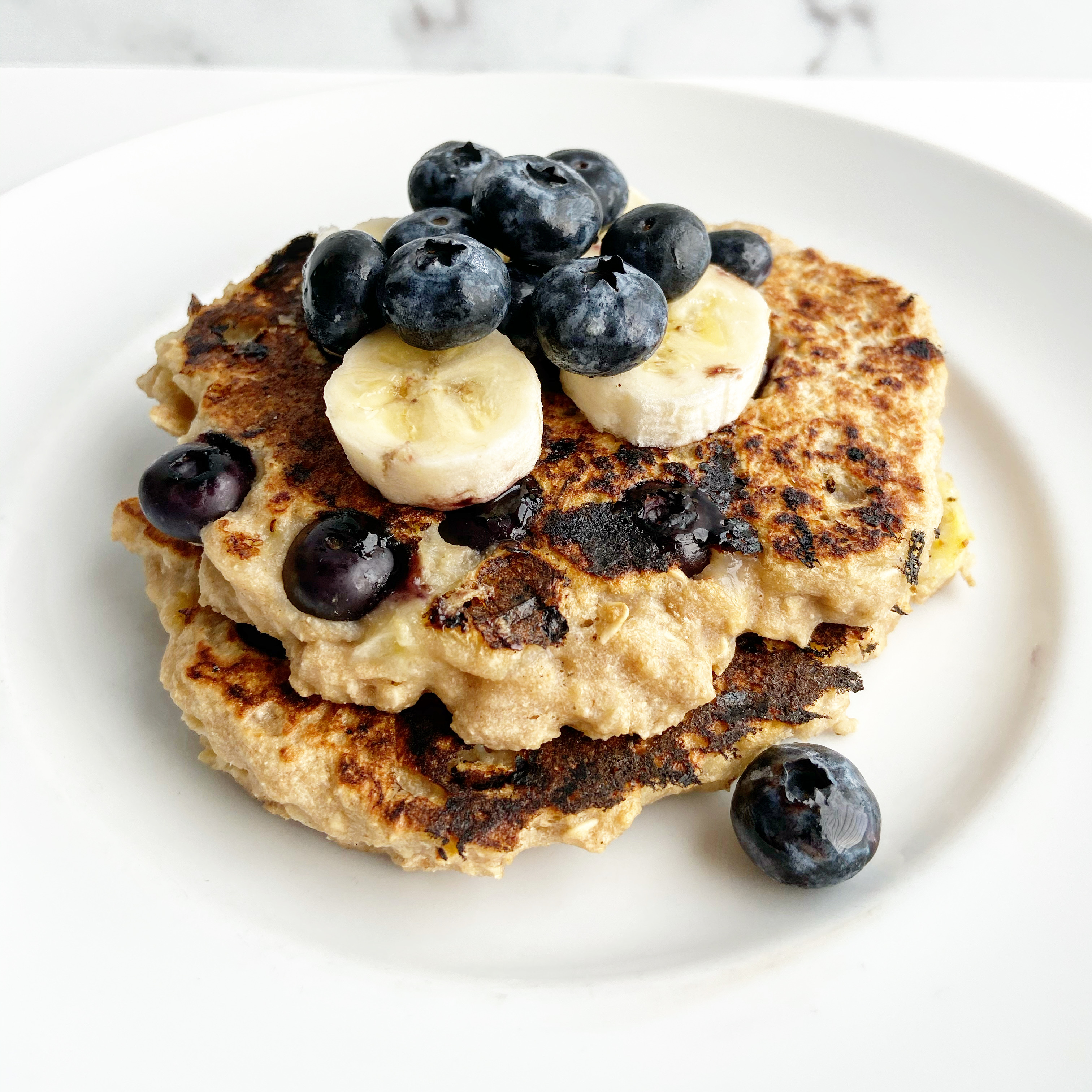 Vegan Banana Oat Blueberry Pancakes